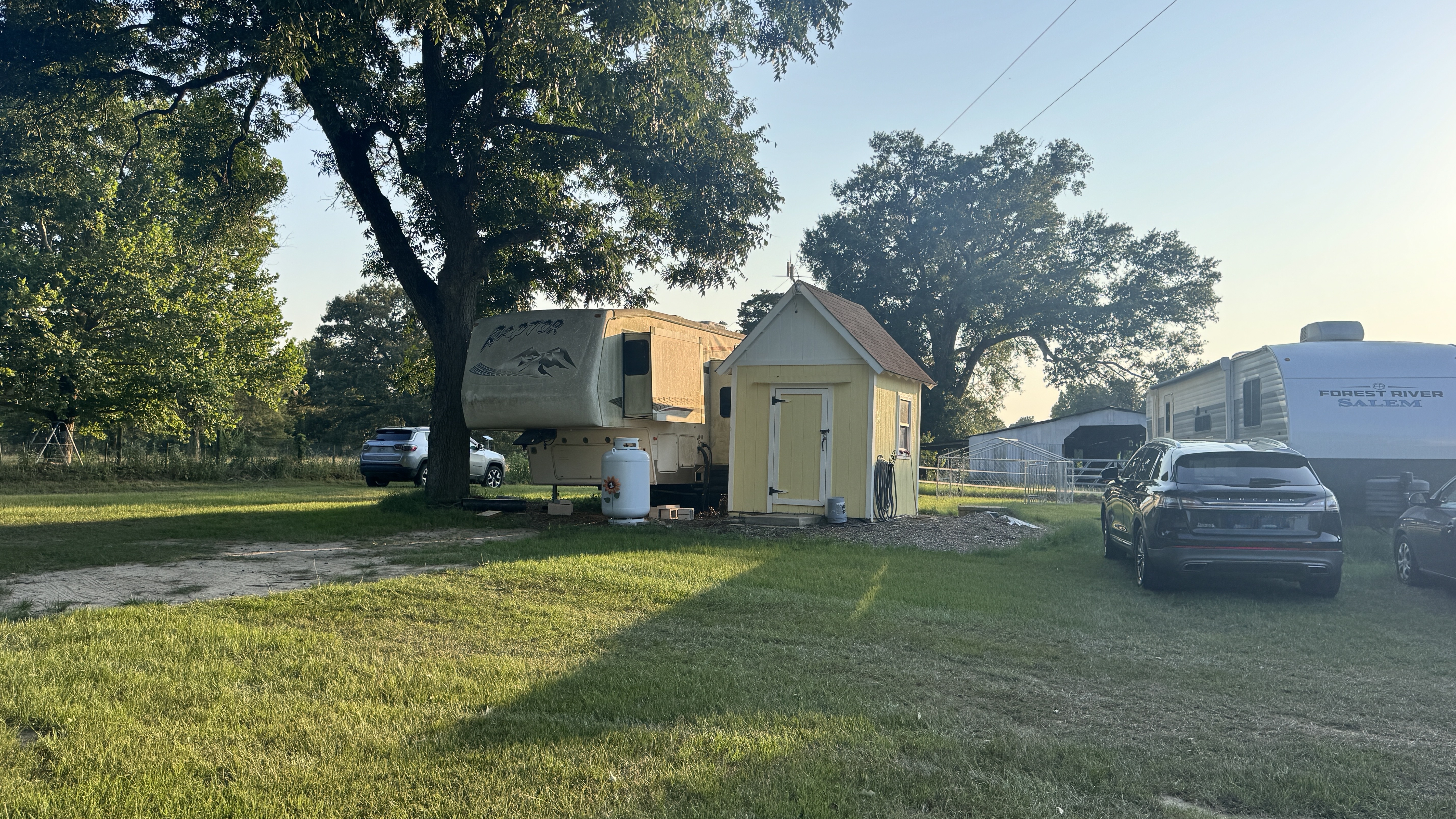 The Raptor rental RV exterior at Ancient Oak Resort RV park Longview TX